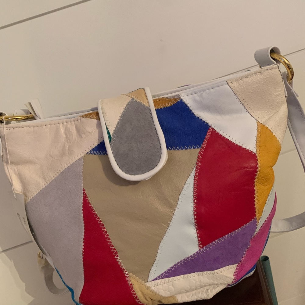 Great 1980’s leather patchwork purse. Still has tag.
